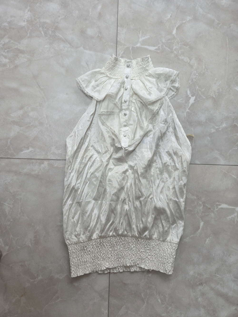 White Ruffled Sleeveless Blouse